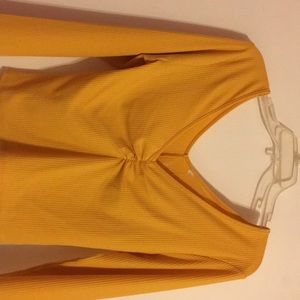 Very cute basic mustard top.